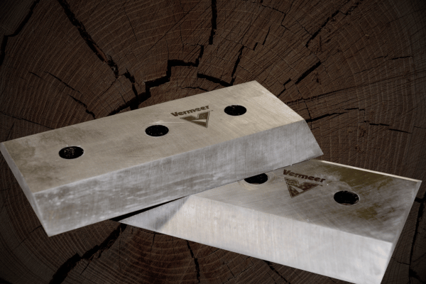 vermeer brush chipper knives on tree stump background