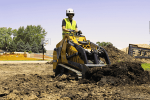 Vermeer ML80 Mini Loader with bucket moving dirt