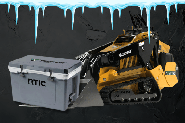 Vermeer Mini Loader with bucket holding RTIC Cooler